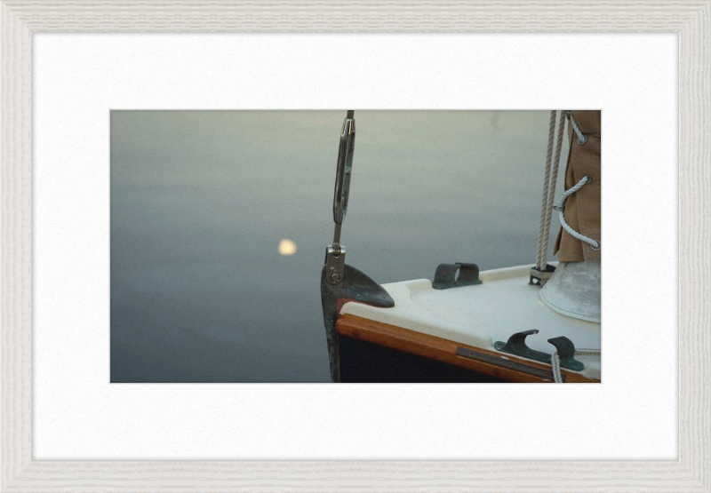 Forestay with setting moon reflection