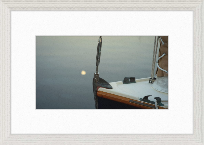 Forestay with setting moon reflection